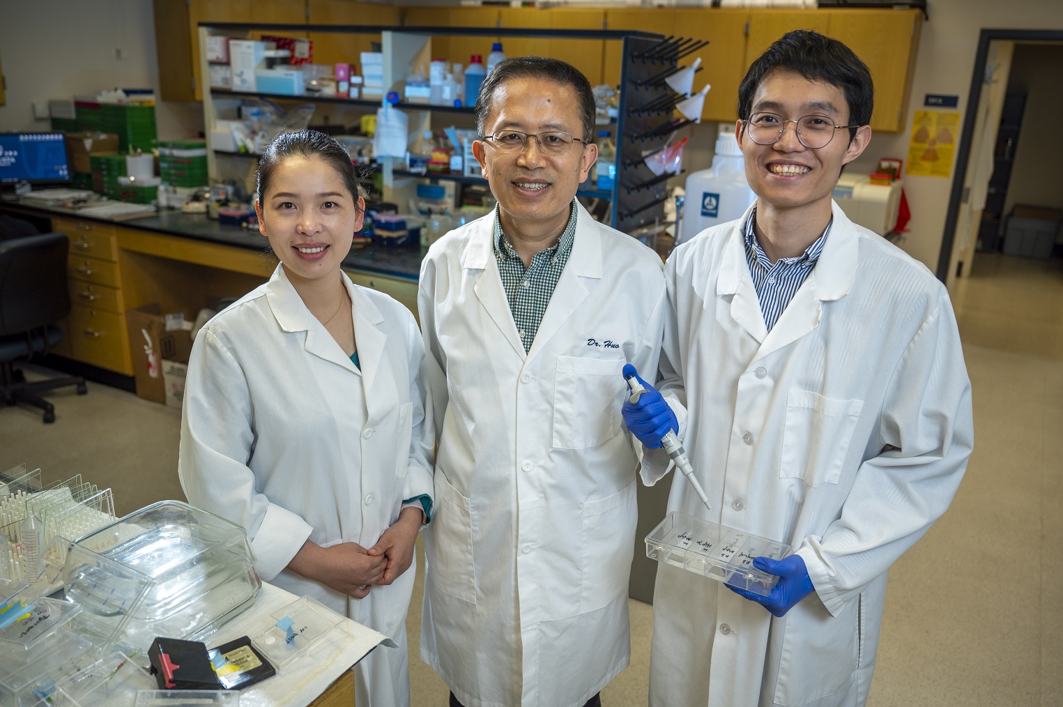 Qiuhua Yang, PhD, Yuging Huo, MD, and Yongfeng Cai, PhD [Michael Holahan/Augusta University] 