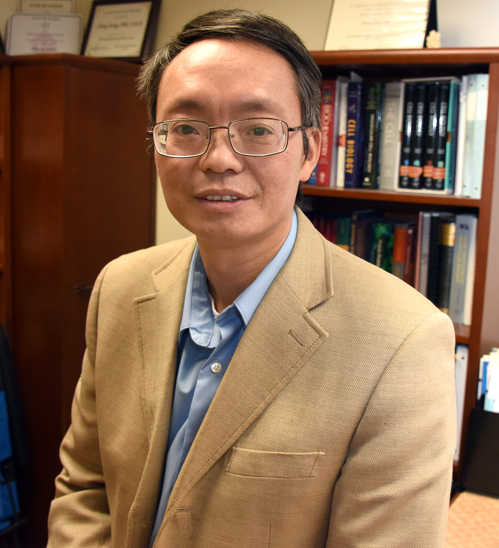 Dr. Zheng Dong