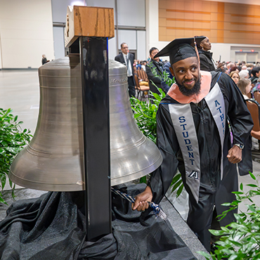 Arsenal bell being rung by president Keel.