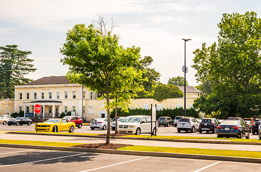 Fanning Hall with parking lots in foreground