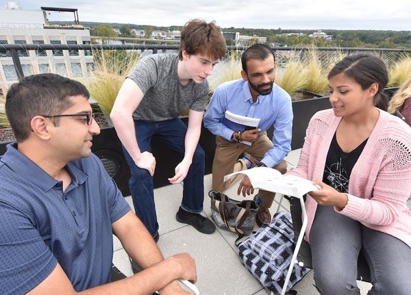 Group of students outside talking together