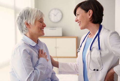 Doctor discussing clinical trial enrollment with cancer patient