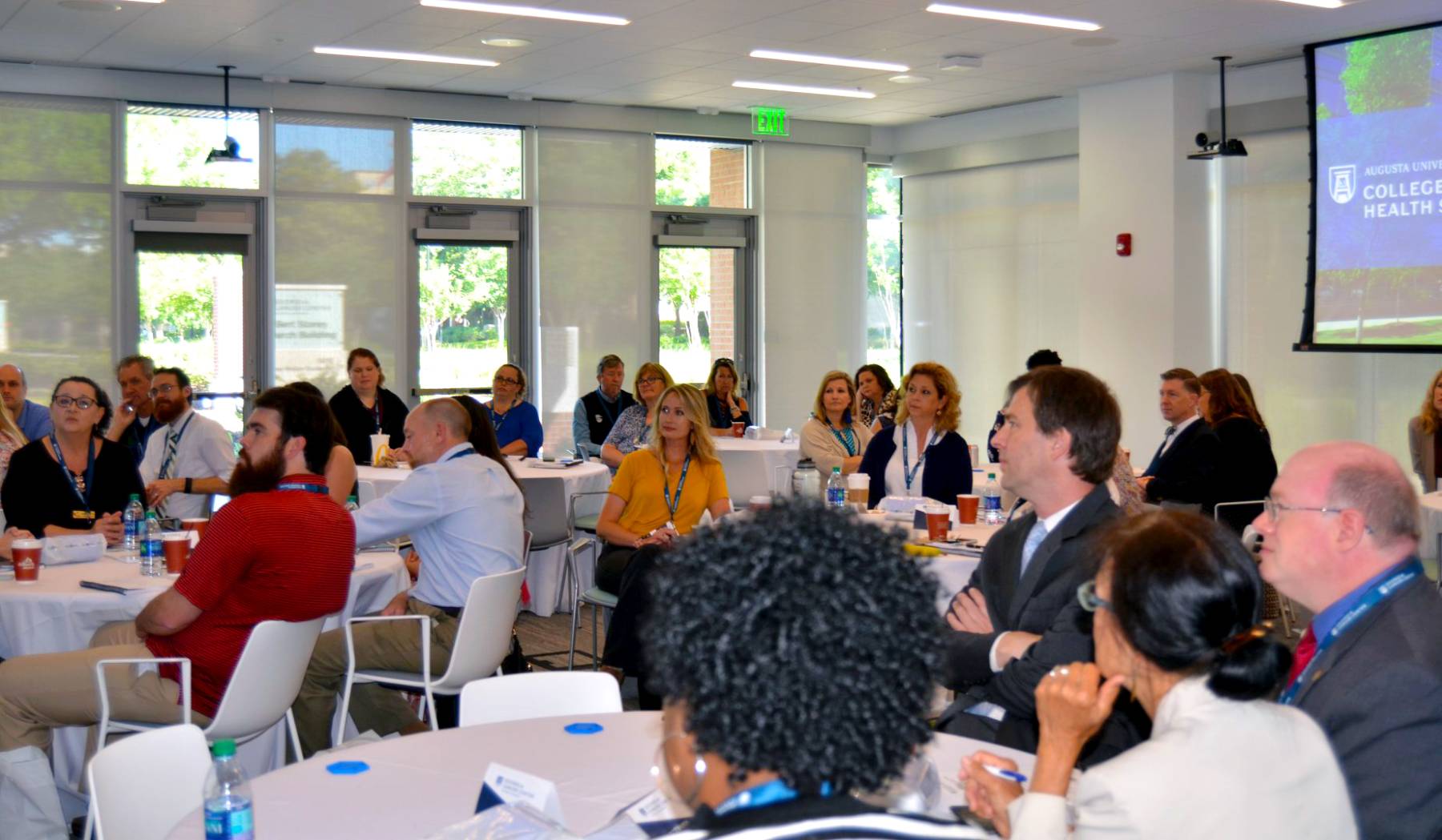 People sitting in conference room