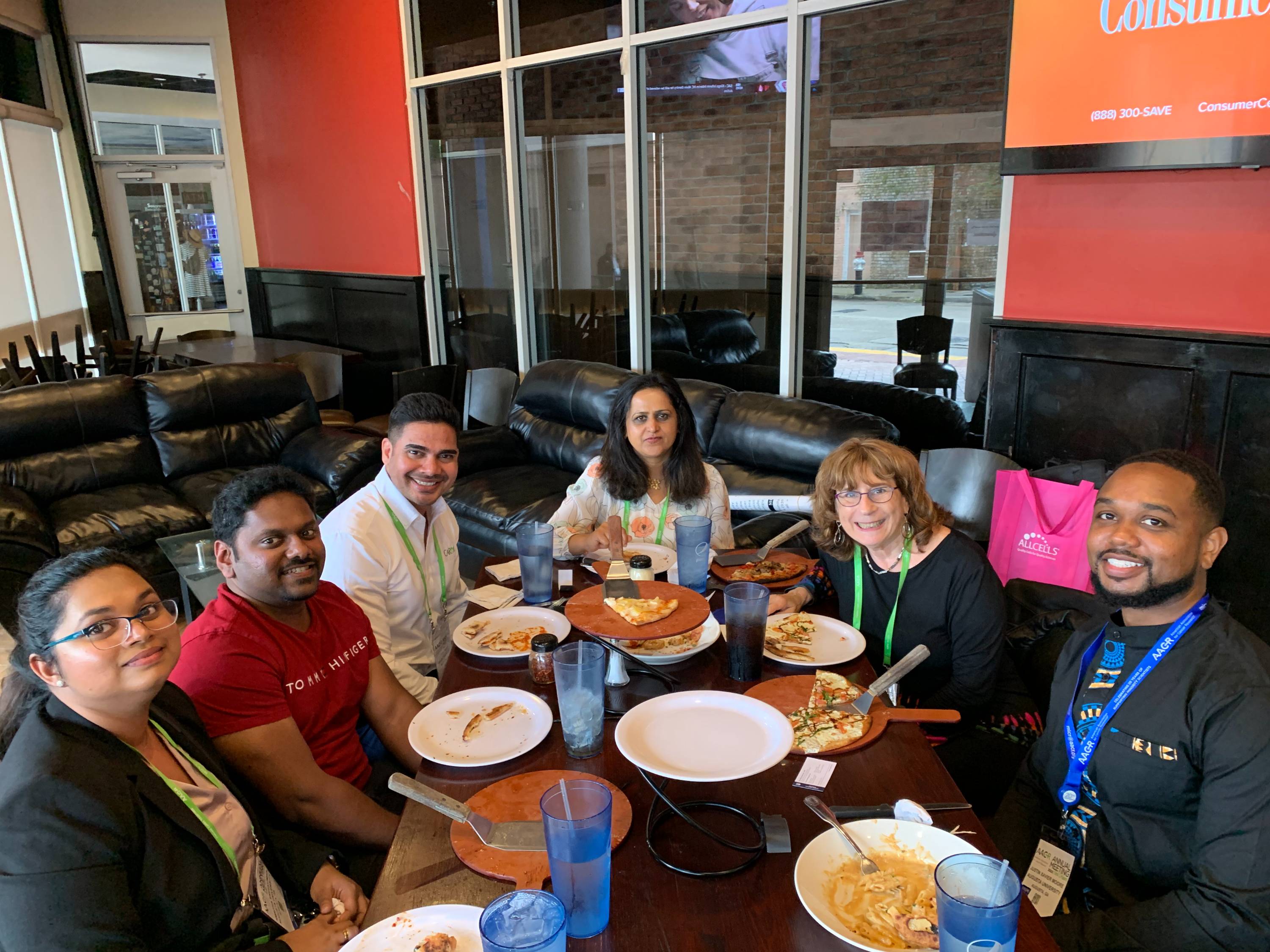 People sitting around a table eating