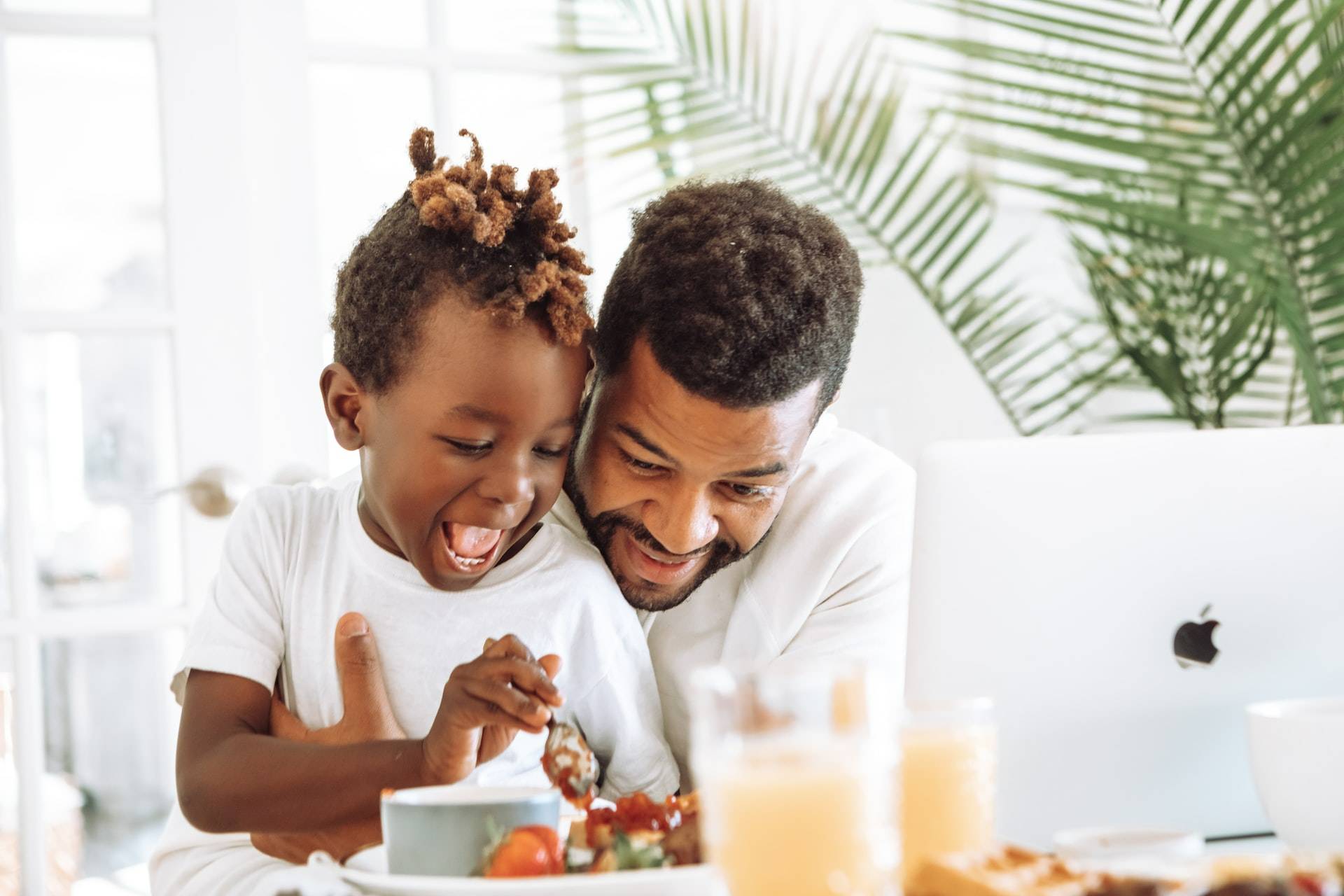 A parent and child sitting together