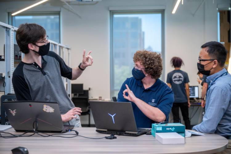 students working on computer 