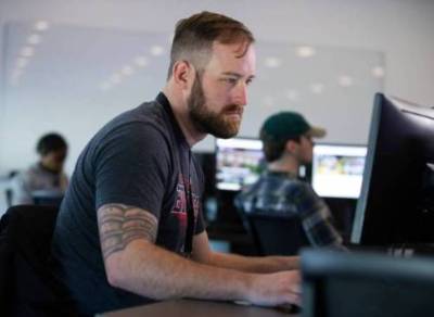 student working on computer