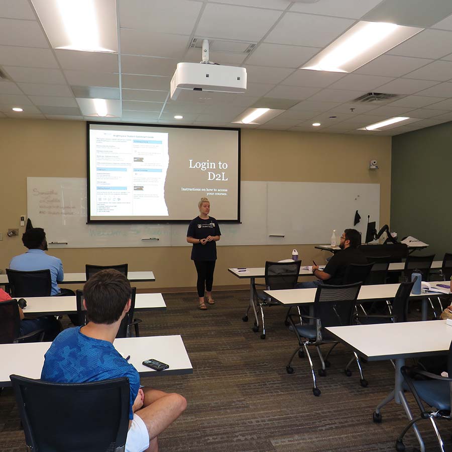 Presenter giving workshop to students