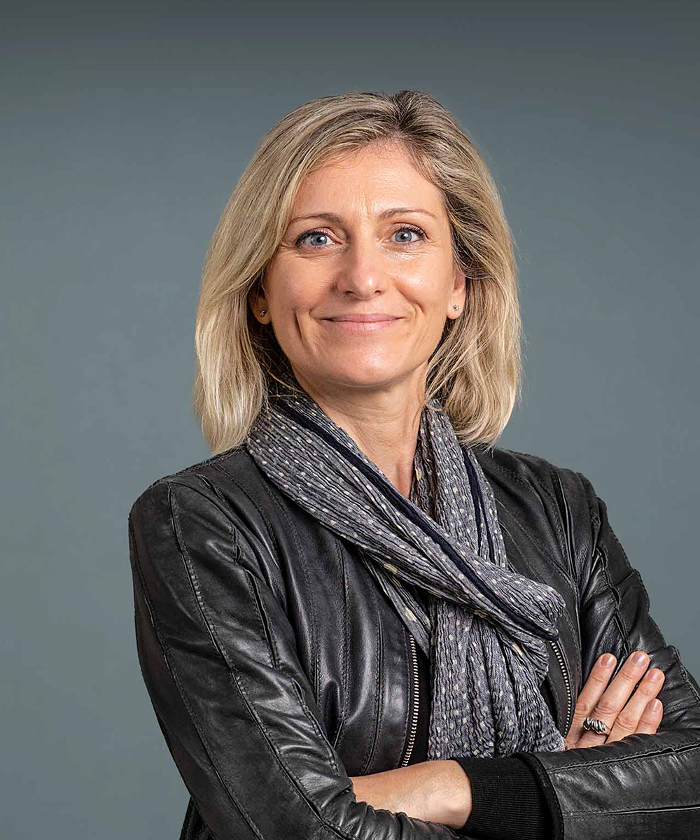 A woman smiling