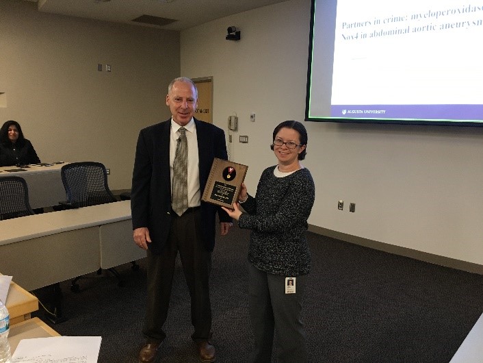 Ross McIntyre Award for Dr. Neal Weintraub w/ Erica Boeson