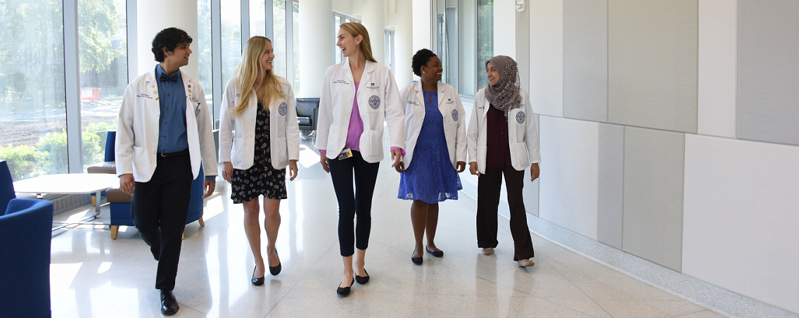 MCG students walking through Harrison Commons