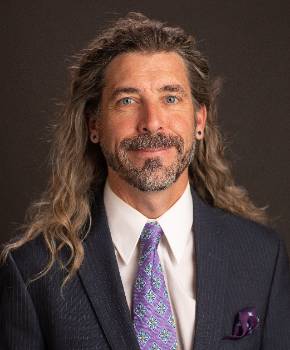 photo of Dustin Tracy, PhD