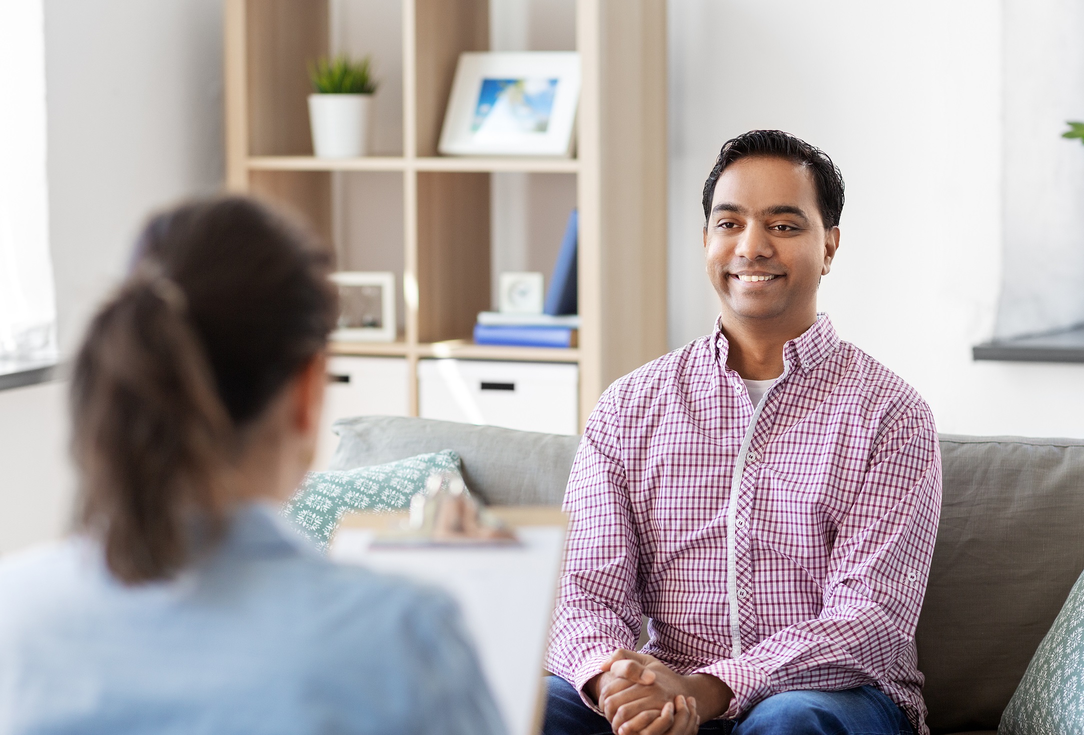 male patient talks to doctor