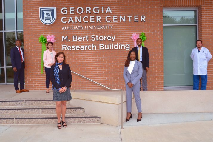 Faculty in front of GA cancer center