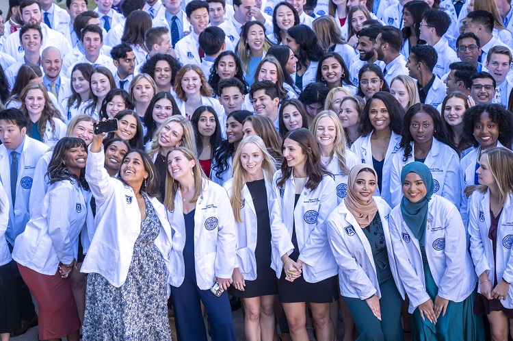 Group of young adults posing for camera at White Coat Class of 2027