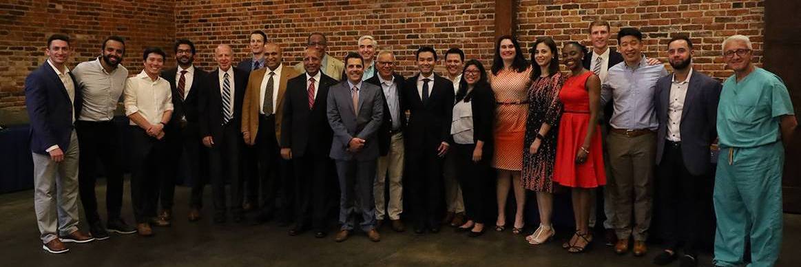 Faculty with Fellows at graduation