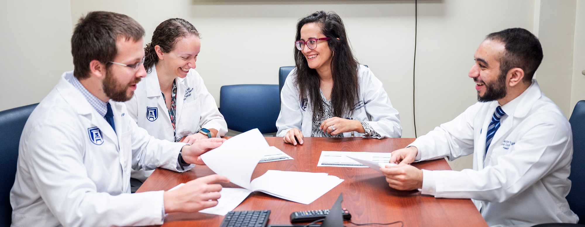 Endocrinology students sitting at table