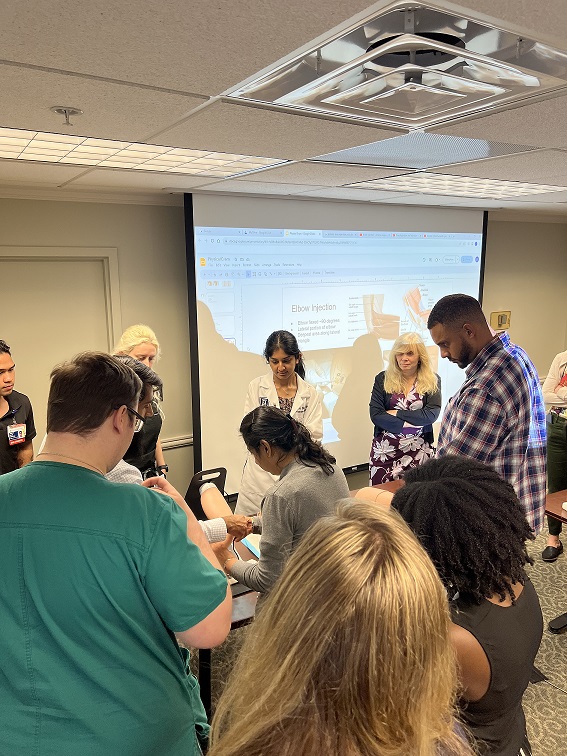 Fellows practicing Joint injections at WED Didactics