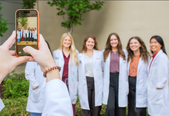 PGY-3 takes a photo of classmates
