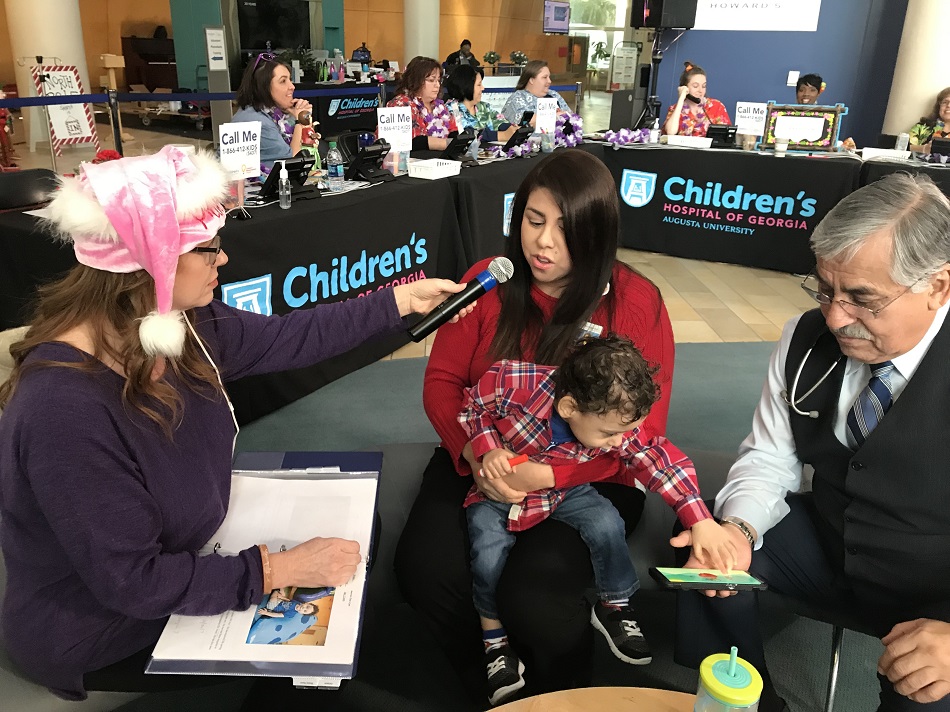 Dr. Ortiz and patient mother interviewed at Radiothon