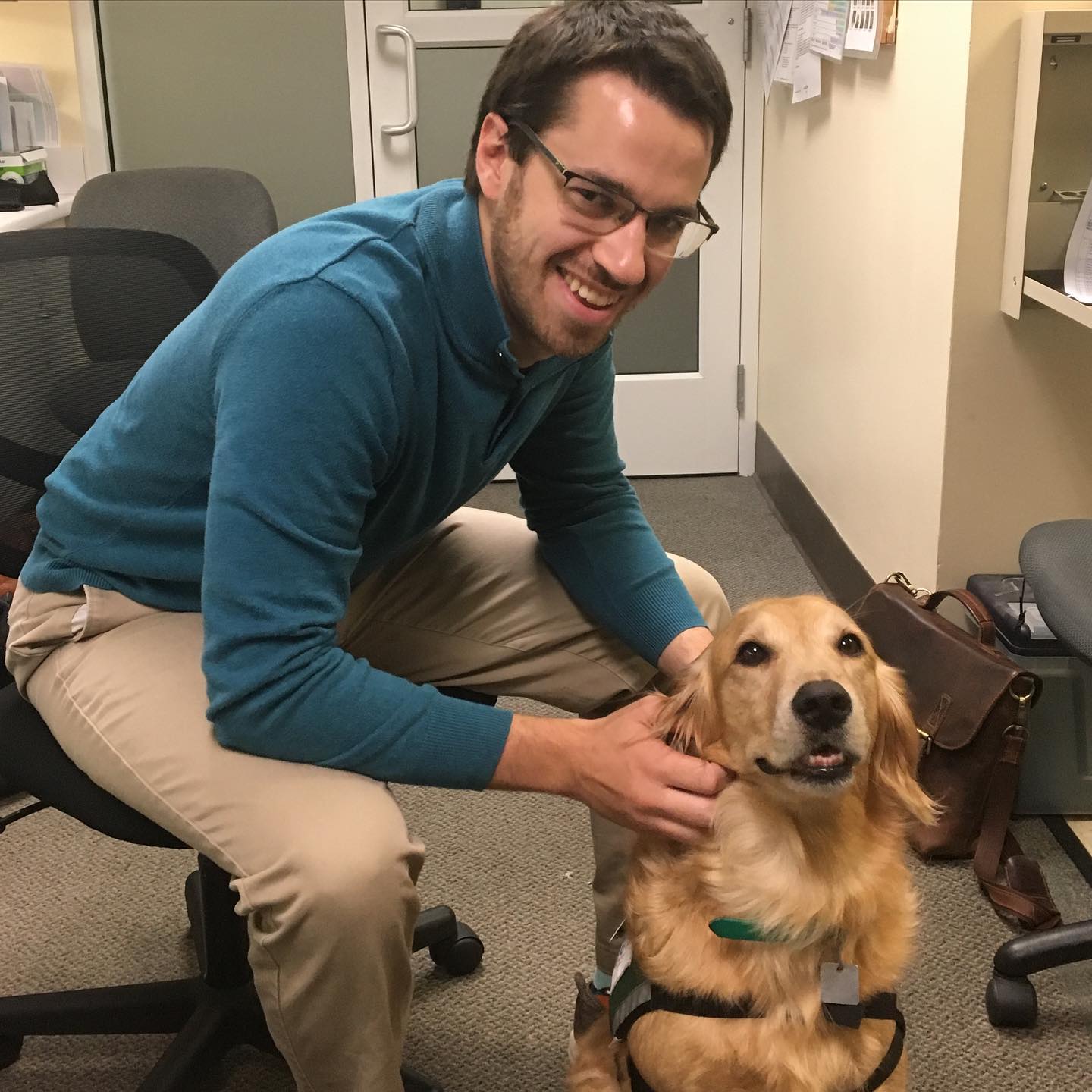 photo of Time with Nugget, our hospital therapy dog