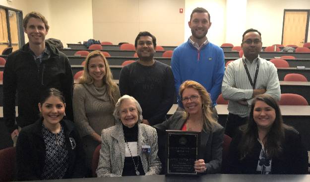 Lois Ellison Lectureship speaker Dr. Kathryn Sandberg with Dr. Lois Ellison and postdoctoral fellows.