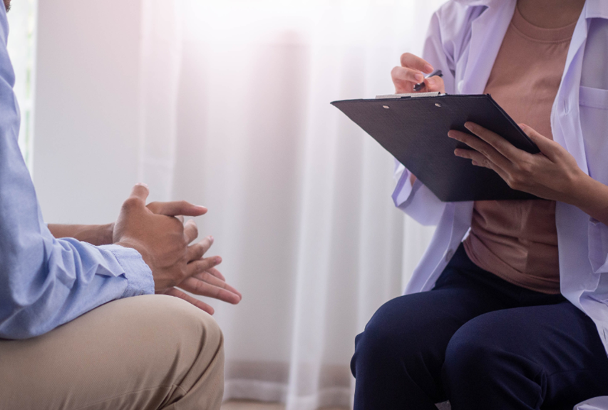 Patient speaking with psychiatrist