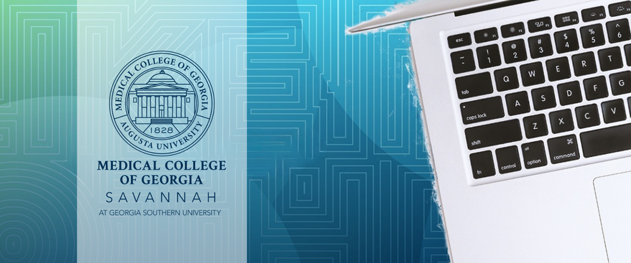 Image of a laptop with the Savannah MCG logo