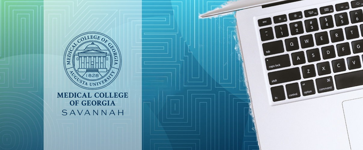 Image of a laptop with the Savannah MCG logo