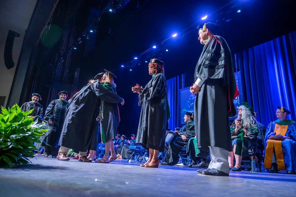 fourth year hooding ceremony