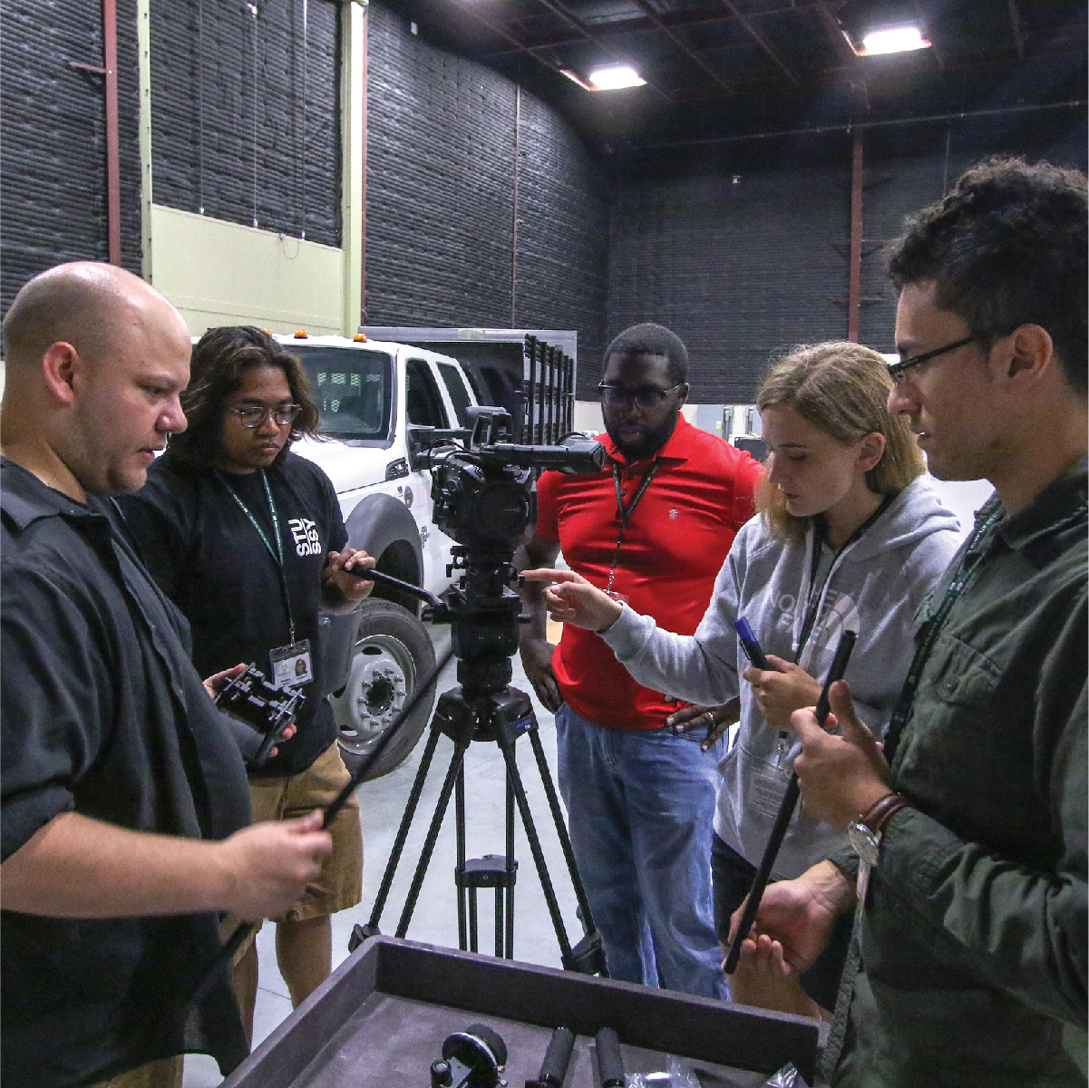 gfa students standing around the camera