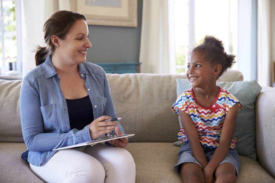 Social worker with child