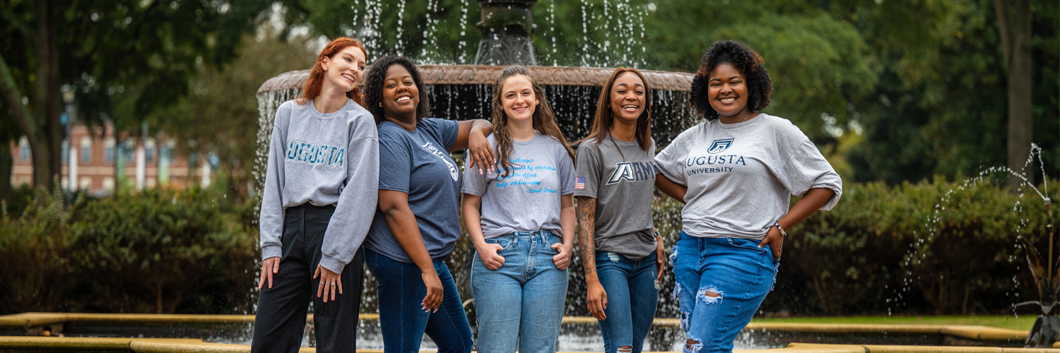 girls infront of fountain