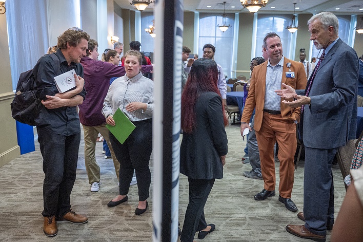 Provost and Vice Provost discuss research with undergraduates