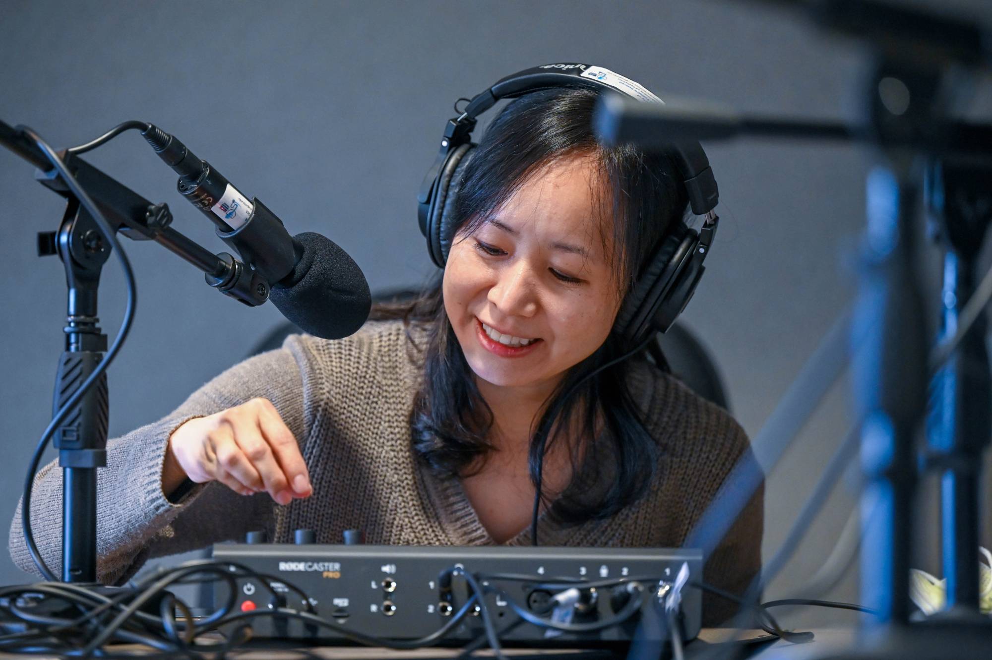 woman smiling with headphones