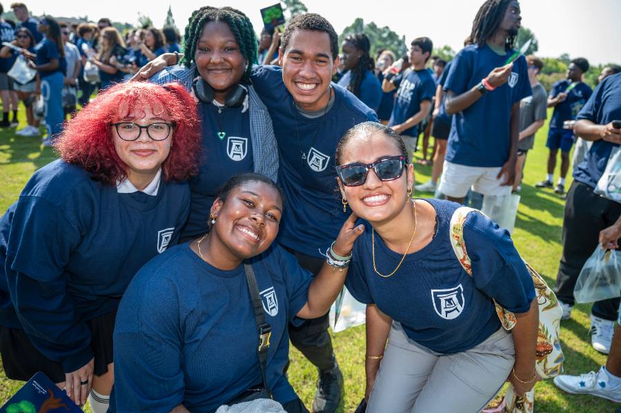 group of students gathered together and smiling