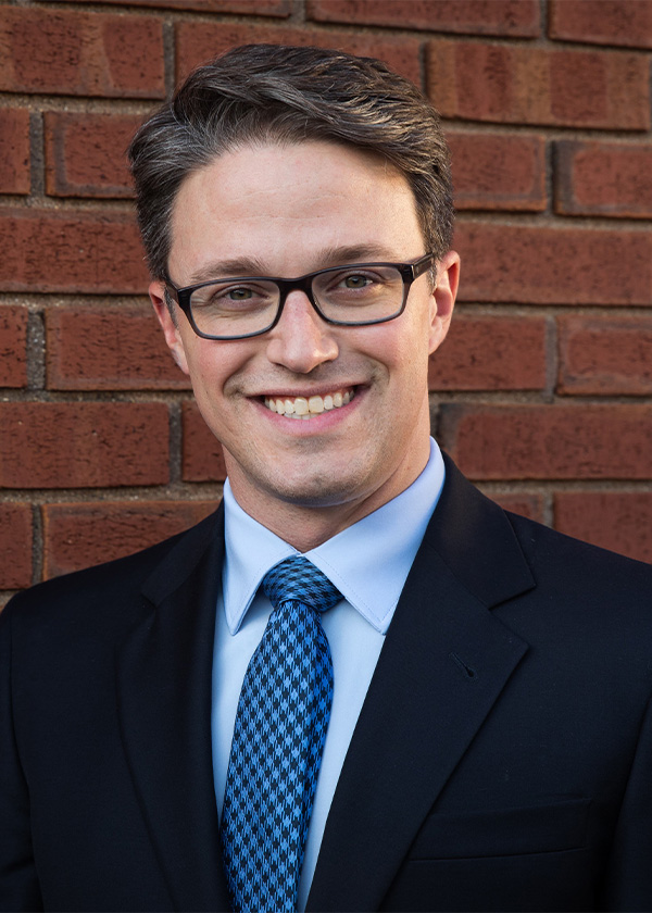 Headshot of Isaac Brinberg