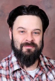 Headshot of Raoul Pacheco