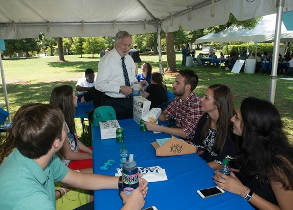 Dr. Keel meets with new students.