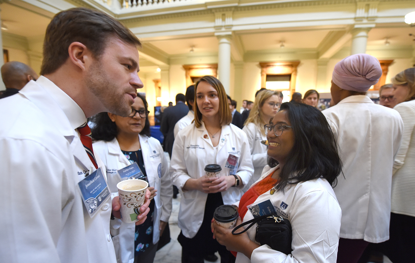 AU students chatting in the Georgia state capitol