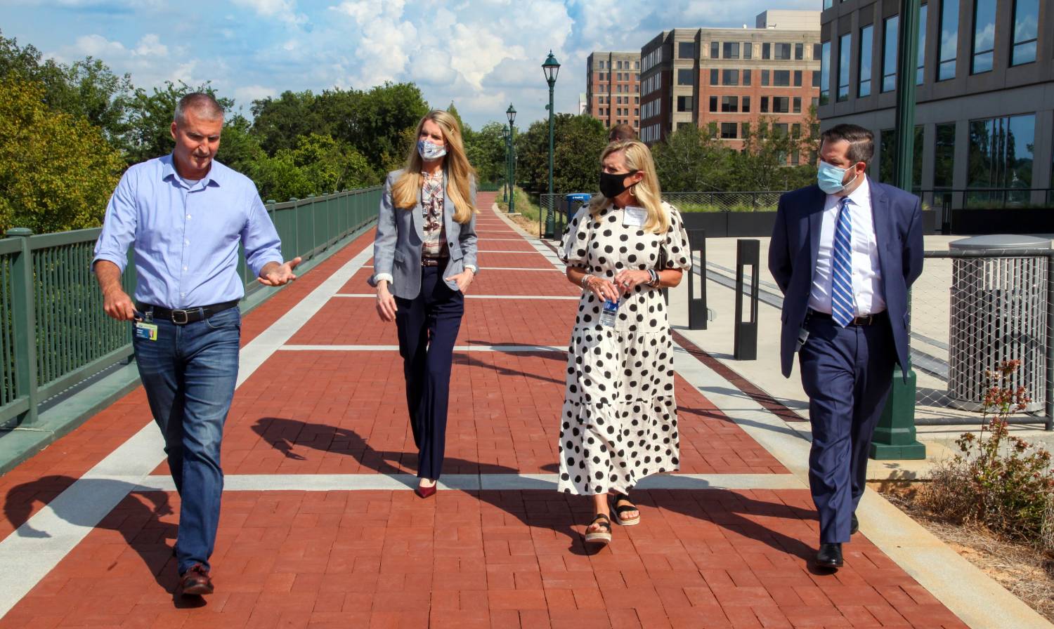 Georgia First Lady Marty Kemp, then-Senator Kelly Loeffler and Russell Keen on the Riverwalk adjacent to the Georgia Cyber Center