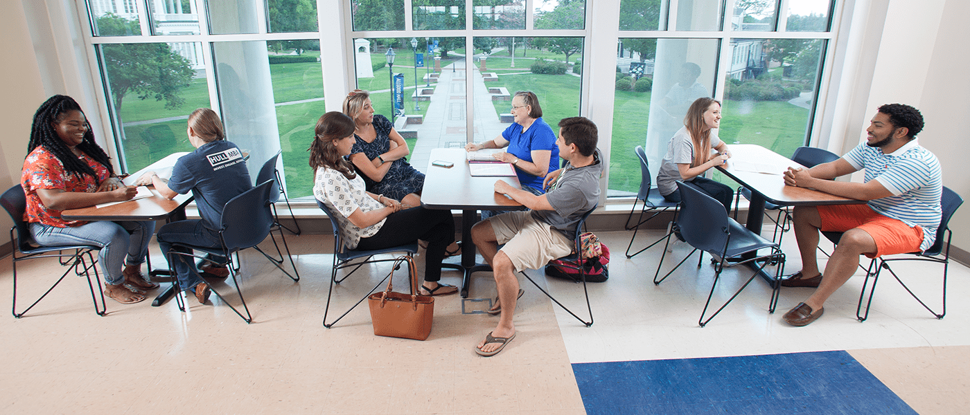 students lounging in Allgood Hall 