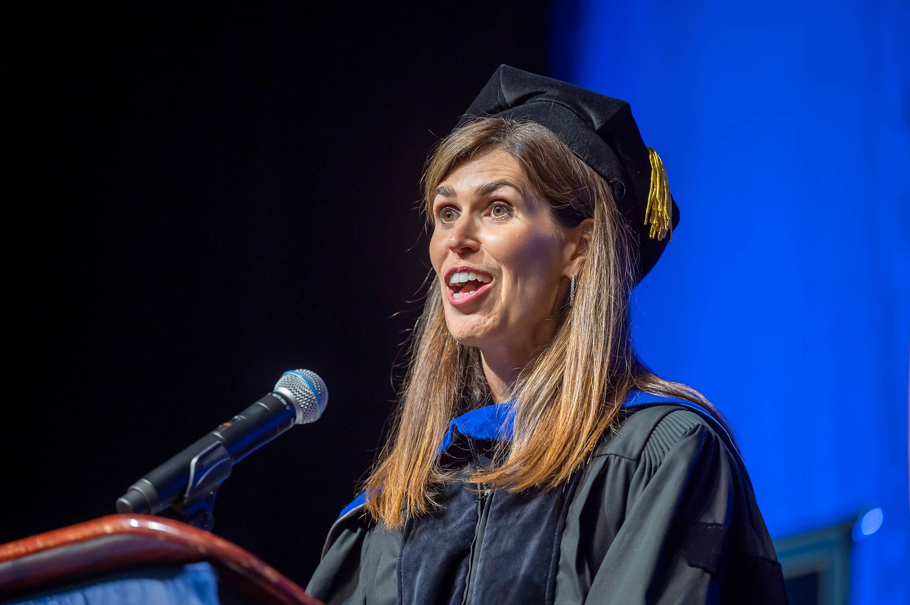 Woman speaking at podium
