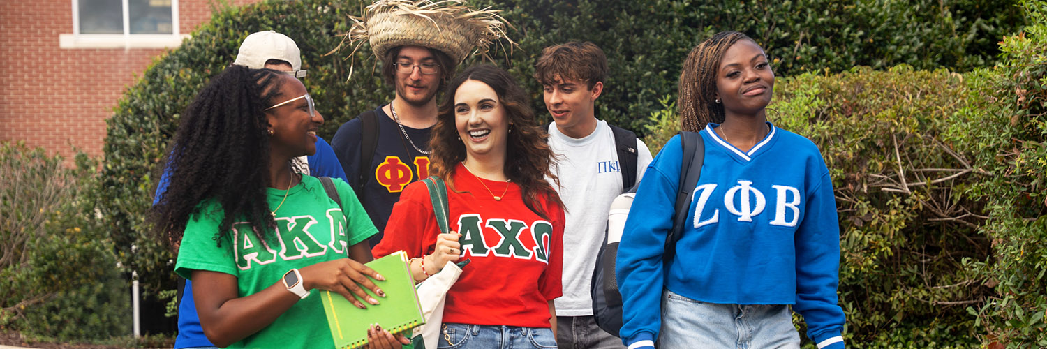 Greek life students walking on campus