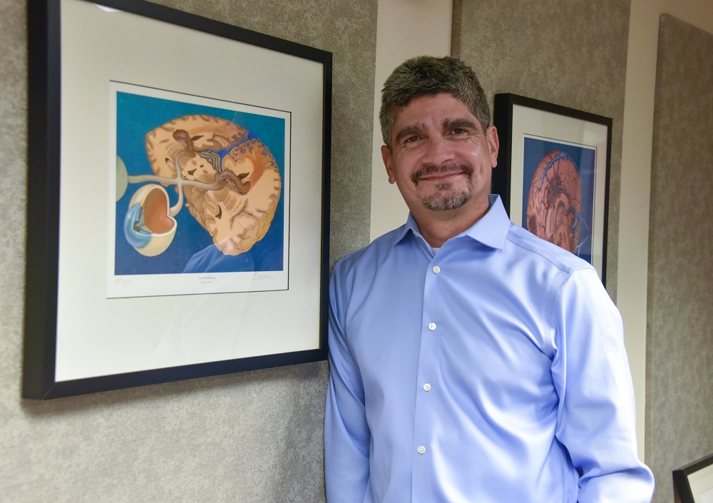 Dr. Vale poses for camera