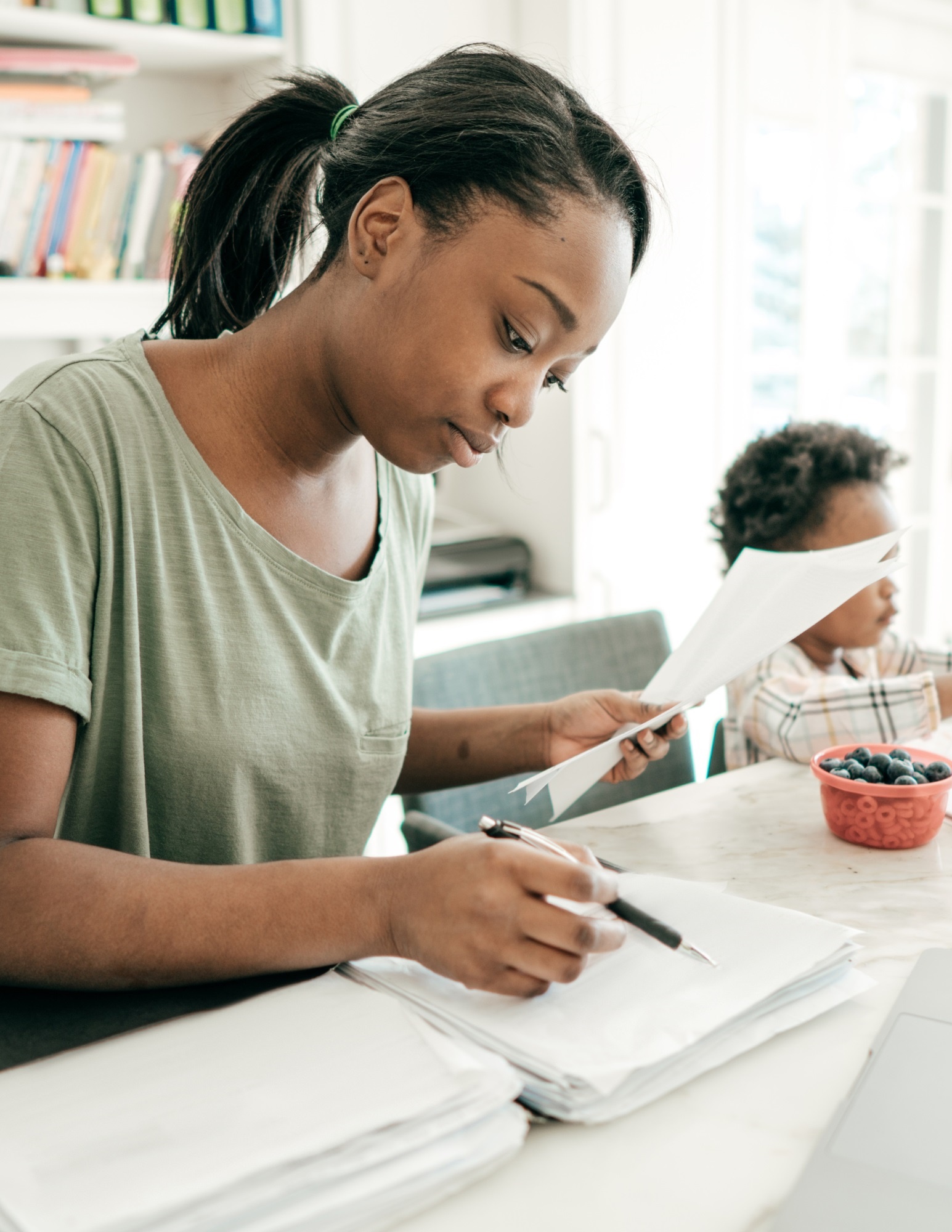 woman looking at papers