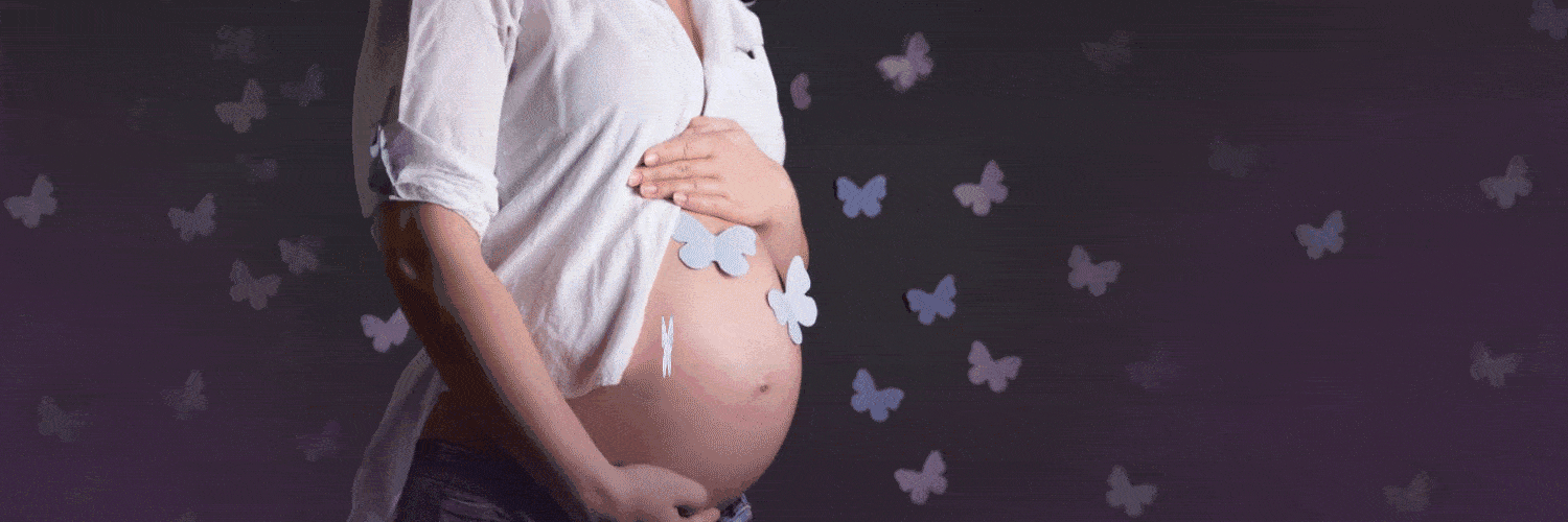 Pregnant woman with hand resting on stomach. She's surrounded by a purple background and purple butterfly shaped cutouts. She has some sitting on her stomach. One of the butterflies is flapping it's wings slowly.