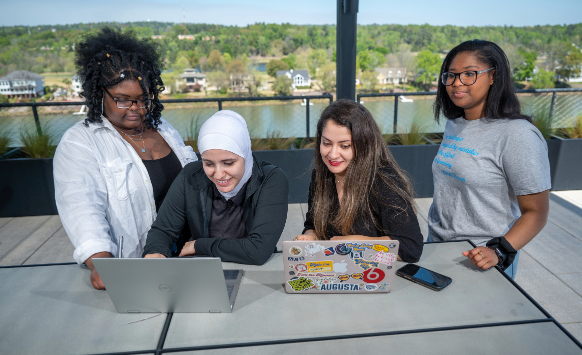 students at laptop