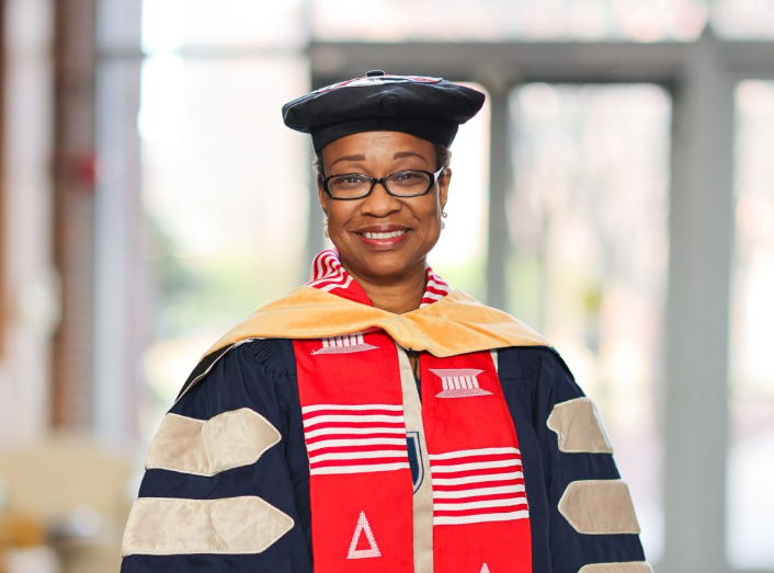 Headshot of Tyra Newton in regalia
