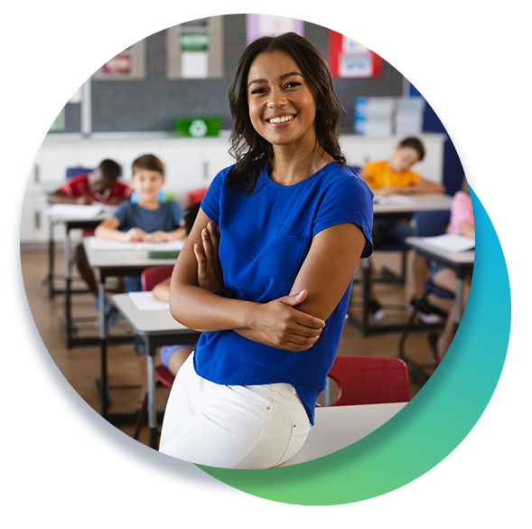 Teacher poses in classroom with students